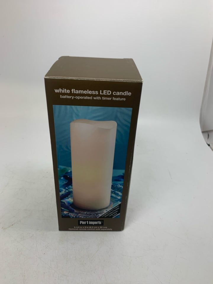 NIB FLAMELESS LED PILLAR CANDLE.