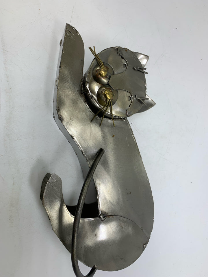 HAND MADE WELDED METAL CAT STRETCHING.