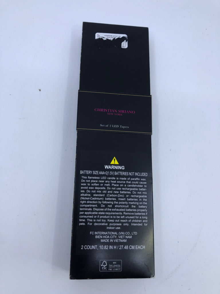NIP BAT TAPER LED CANDLES.