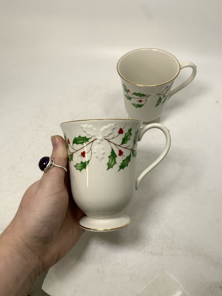 2 LENOX FOOTED HOLIDAY HOLLY BERRY MUGS.
