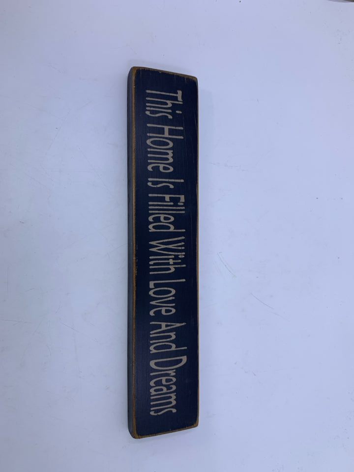 BLACK WOOD THIS HOME IS SIGN.