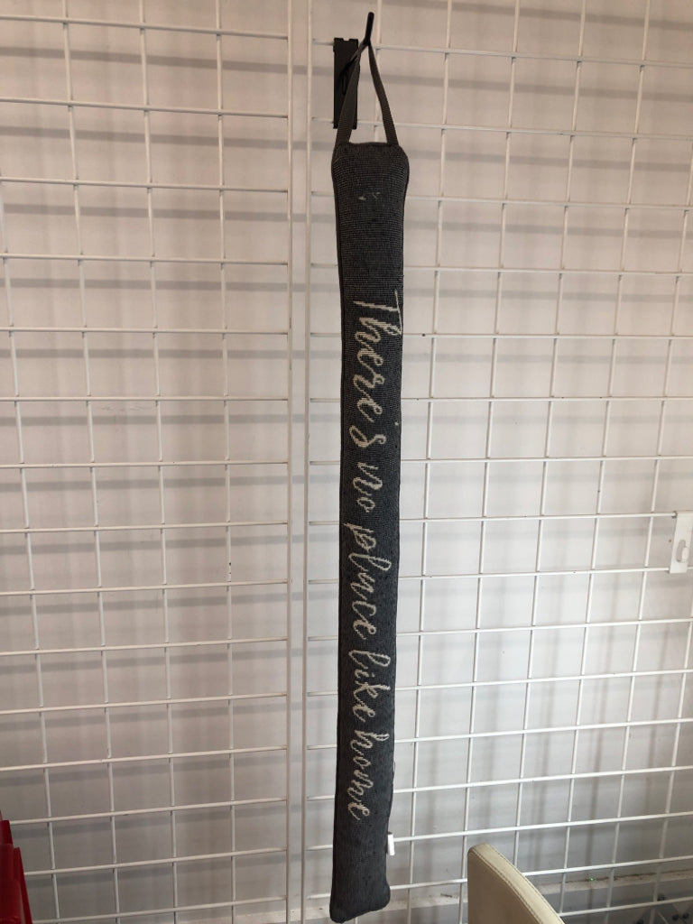 NO PLACE LIKE HOME WEIGHTED DOOR DRAFT STOPPER.