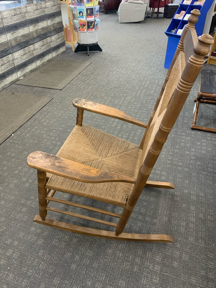 CRACKER BARREL WOVEN SEAT ROCKING CHAIR.