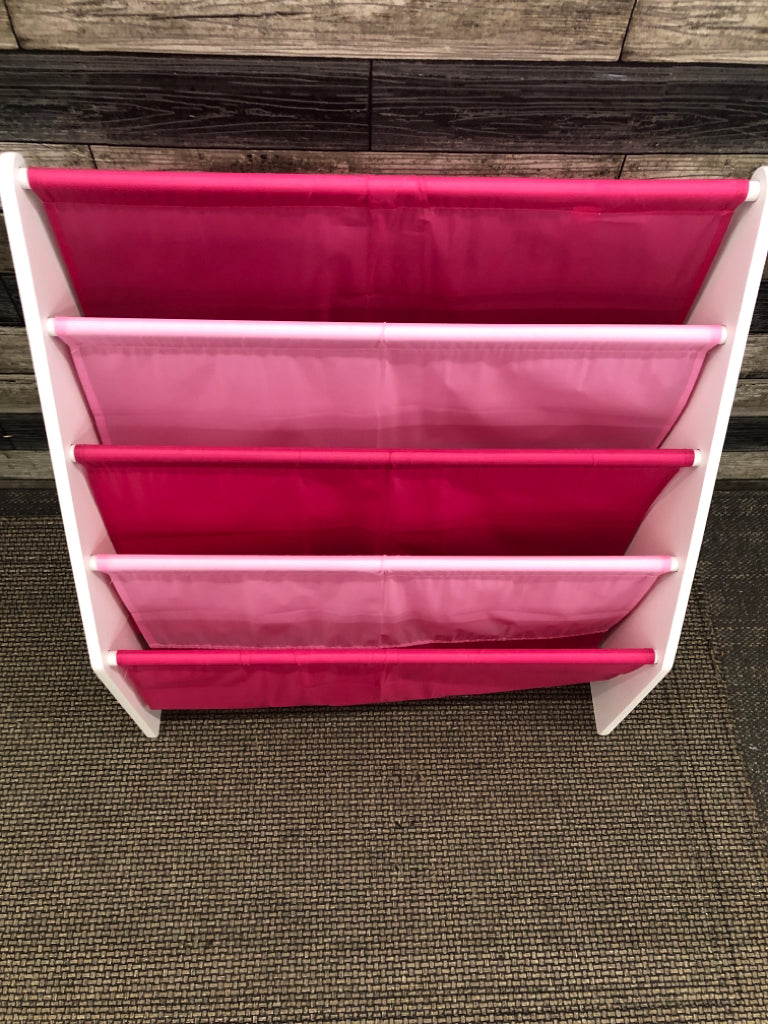 CHILDRENS PINK SLING BOOK RACK.
