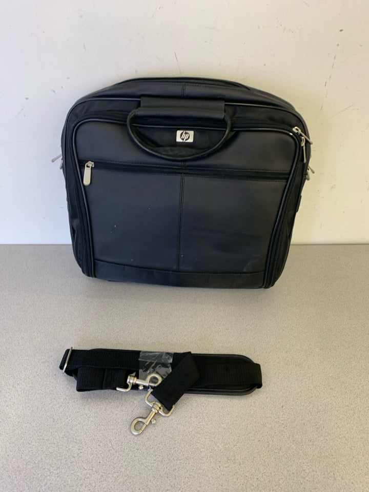 BLACK FAUX LEATHER COMPUTER BAG.
