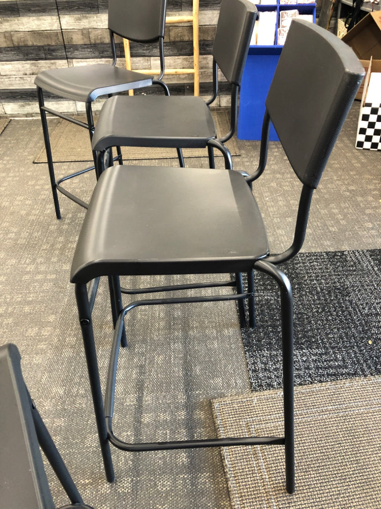 4 BLACK PLASTIC IKEA BAR STOOLS.