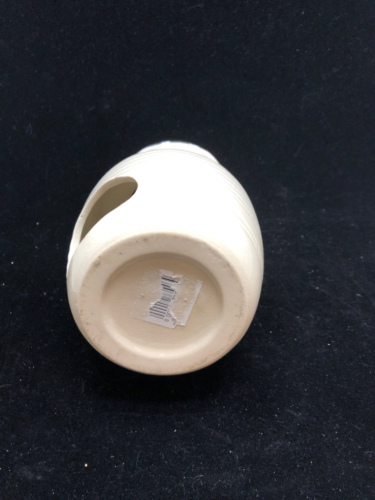 CERAMIC CANDLE HOLDER.