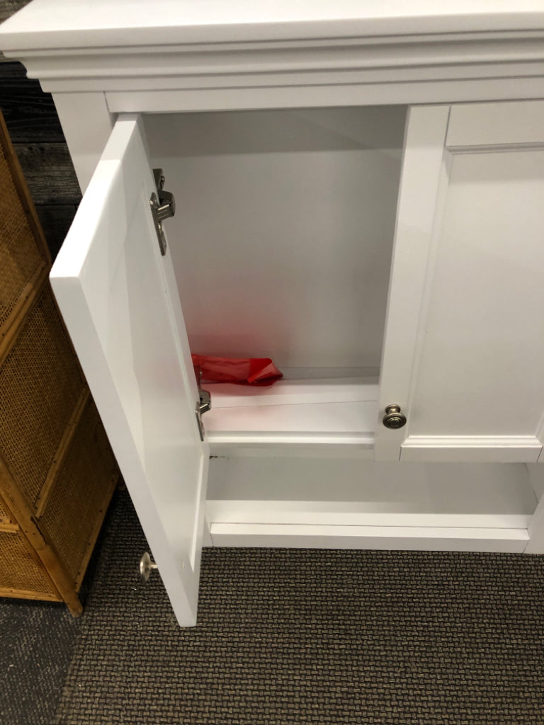 WALL MOUNT CABINET W/ LOWER SHELF.