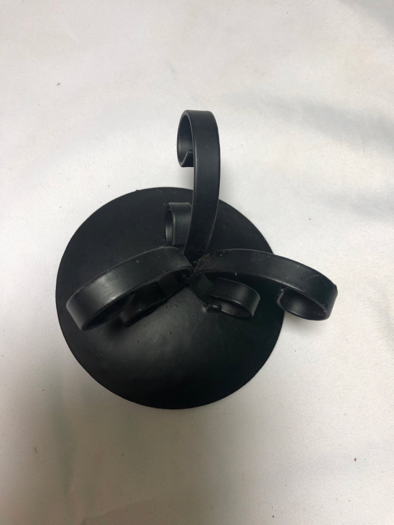 2 METAL SCROLL CANDLE HOLDERS.