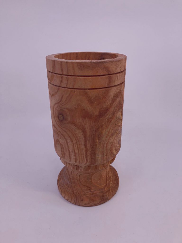 FOOTED WOOD VASE.