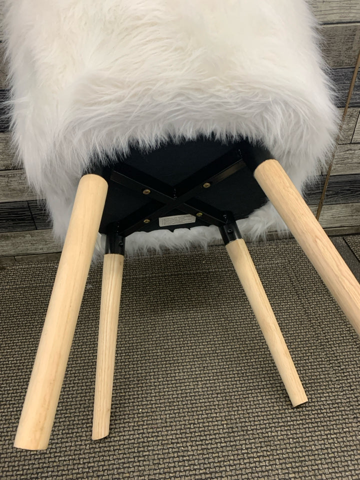 WHITE FUR CHAIR WITH WOOD LEGS.