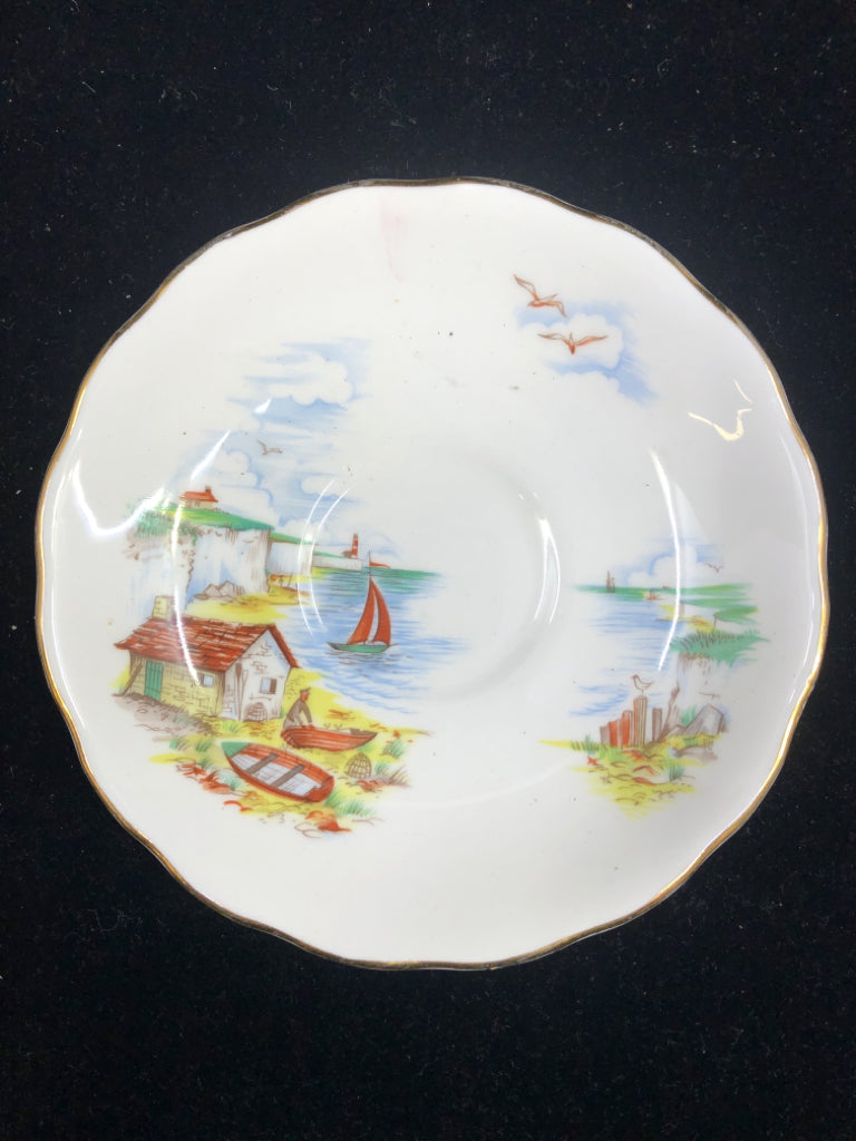 BEACH W SAILBOAT SCENE TEACUP AND SAUCER.