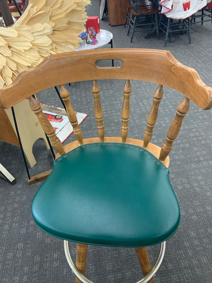 2 WOOD BAR STOOL W/GREEN UPHOLSTERED CUSHION & METAL FOOT REST.
