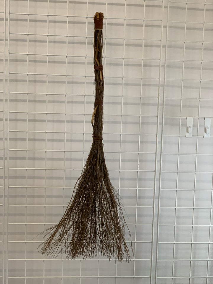 BROWN TWIG BROOM DECOR.