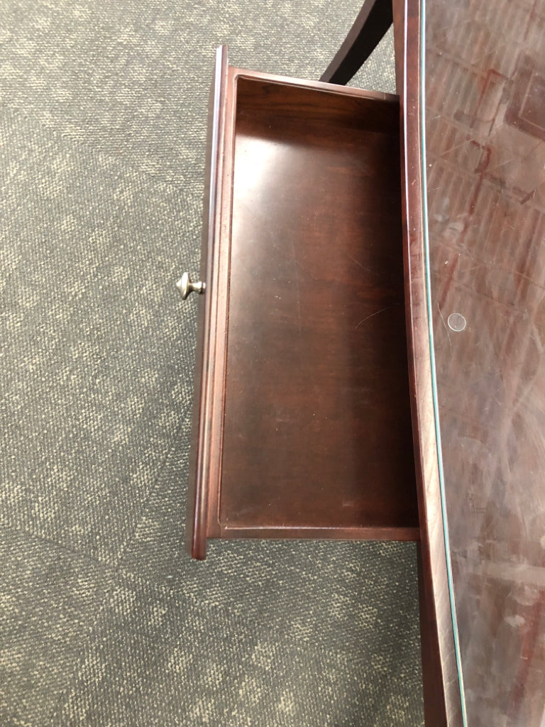 DARK WOOD COFFEE TABLE W/ DRAWER GLASS TOP.