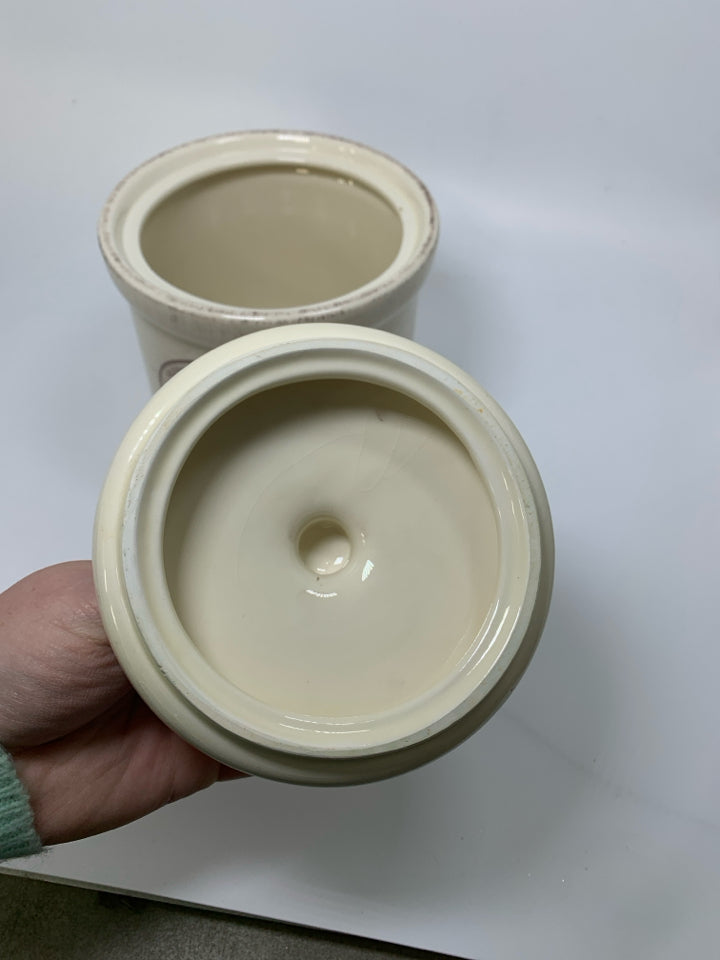 CERAMIC GARLIC HOLDER CANISTER W/ HOLES IN BOTTOM.