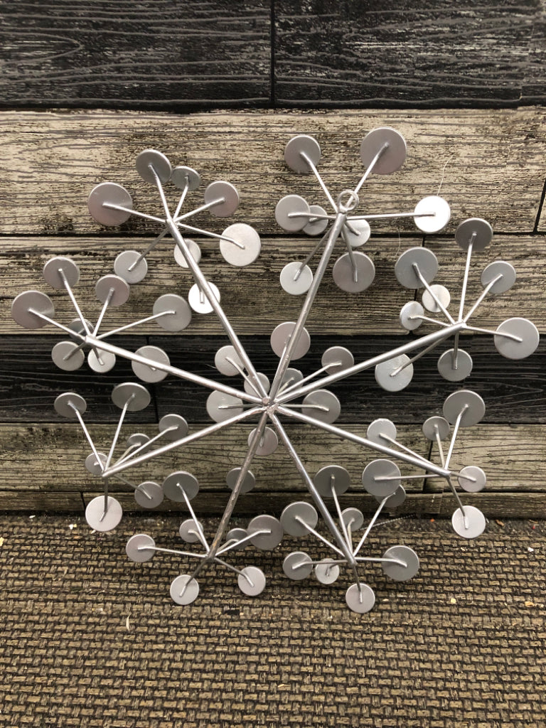 SILVER METAL STARBURST W/CRYSTAL EMBELLISHMENTS.