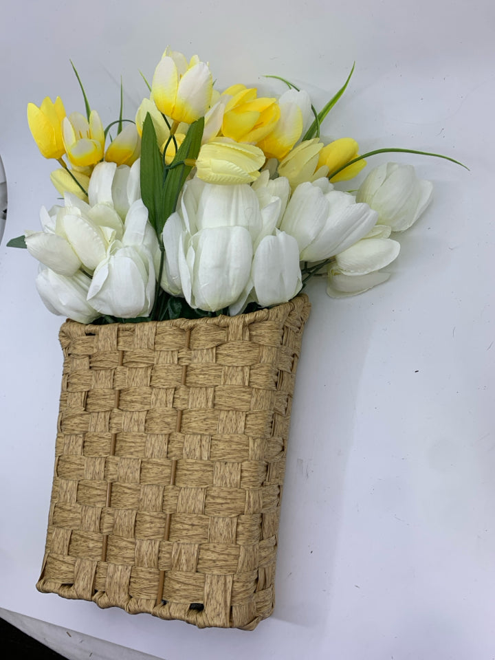 LIGHT WOVEN WALL BASKET W/ WHITE/YELLOW TULIPS.