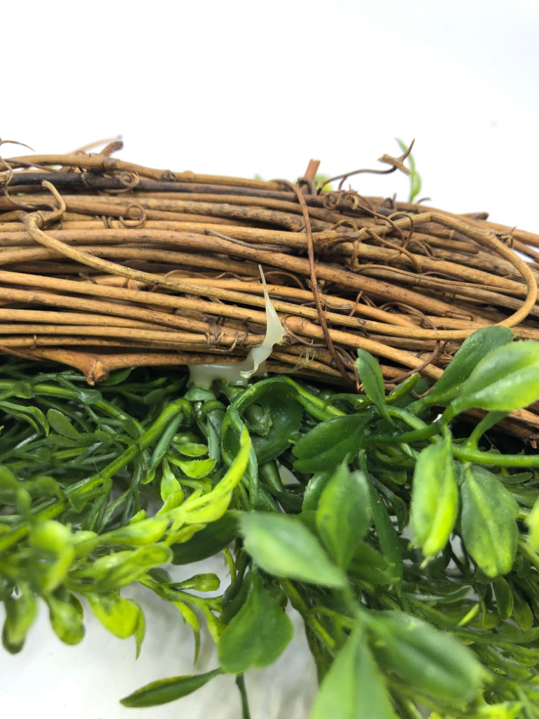 TWIG W GREENS WREATH.