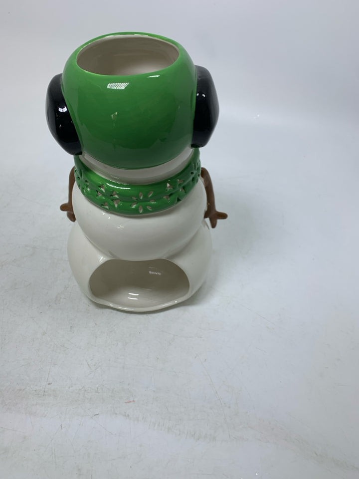 CERAMIC SNOWMAN W/ GREEN SCARF & EARMUFFS TEA LIGHT HOLDER.