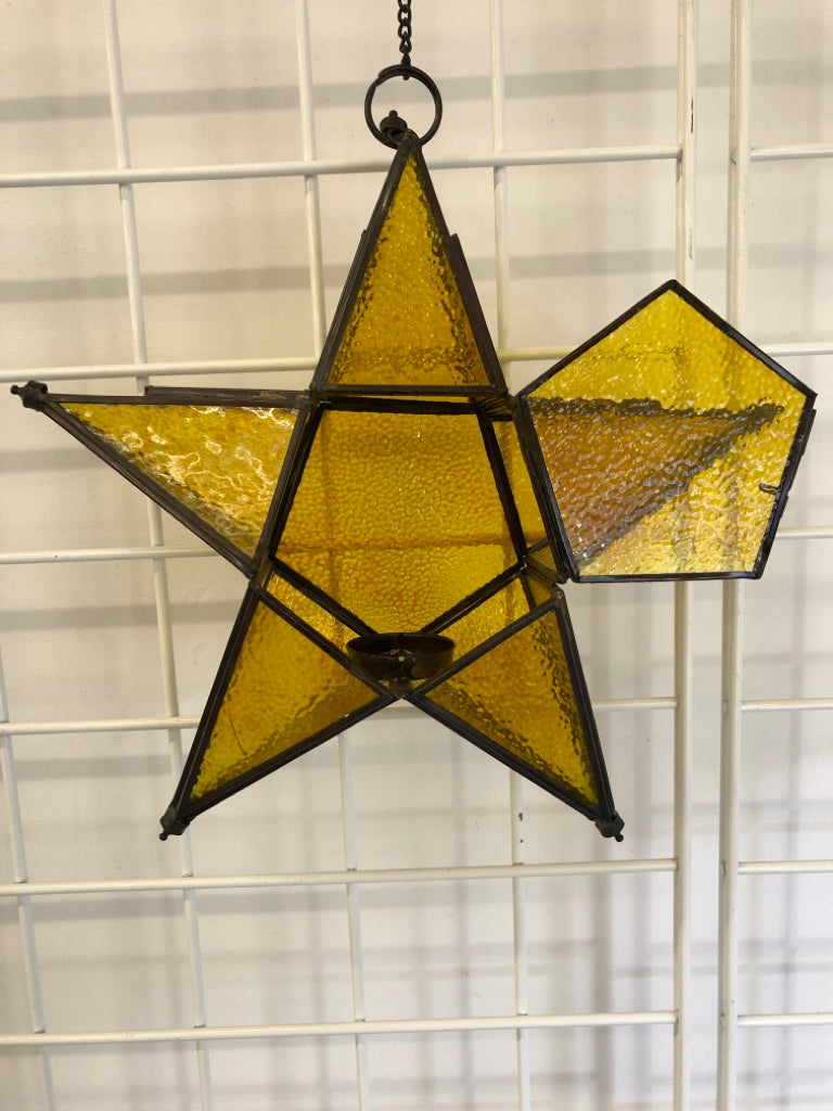 HANGING YELLOW STAR CANDLE HOLDER.