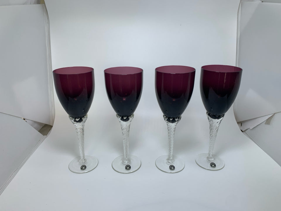 4 DARK PURPLE CRYSTAL WINE GLASSES W/ CLEAR STEMS.