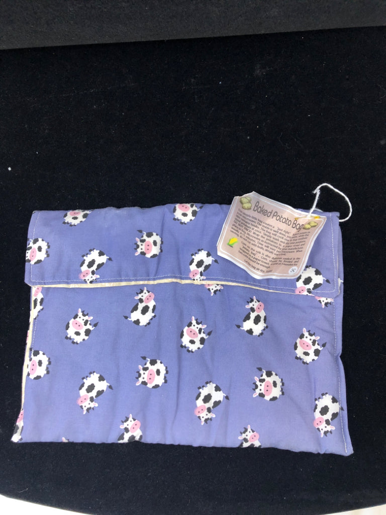BAKED POTATO BAG W COWS ON IT.