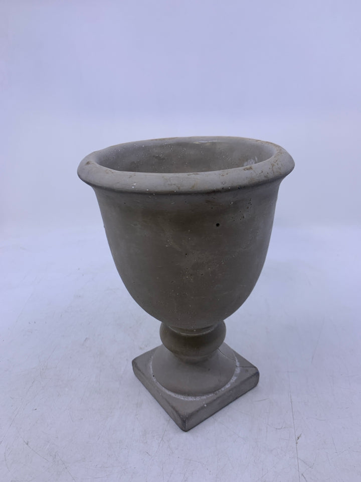 GREY CEMENT FOOTED PLANTER.