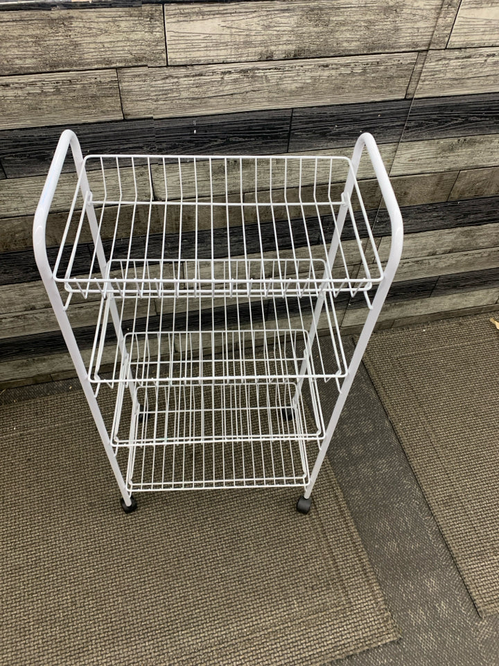 4 TIER WHITE WIRE BASKET SHELF ON WHEELS.