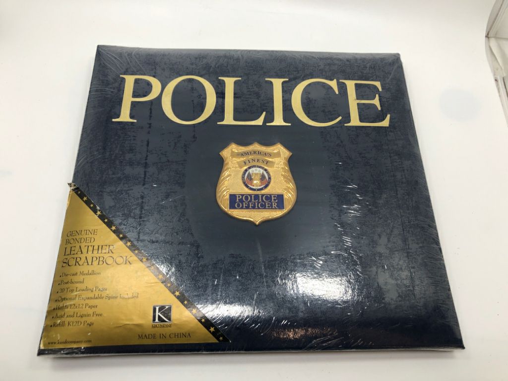 NIP POLICE OFFICER SCRAPBOOK.