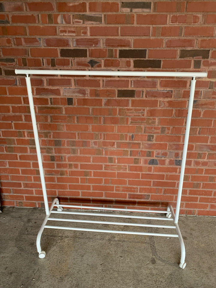 WHITE CLOTHES RACK ON WHEELS & ADJUSTABLE HEIGHT.
