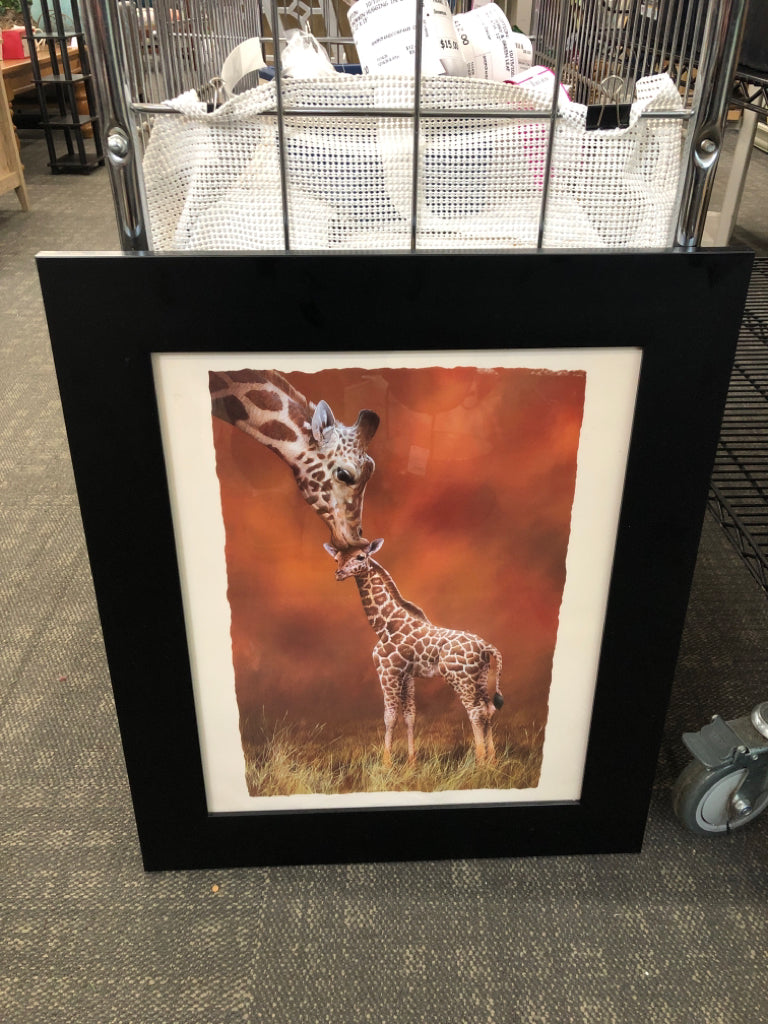 GIRAFFE AND BABY PRINT IN BLACK FRAME.
