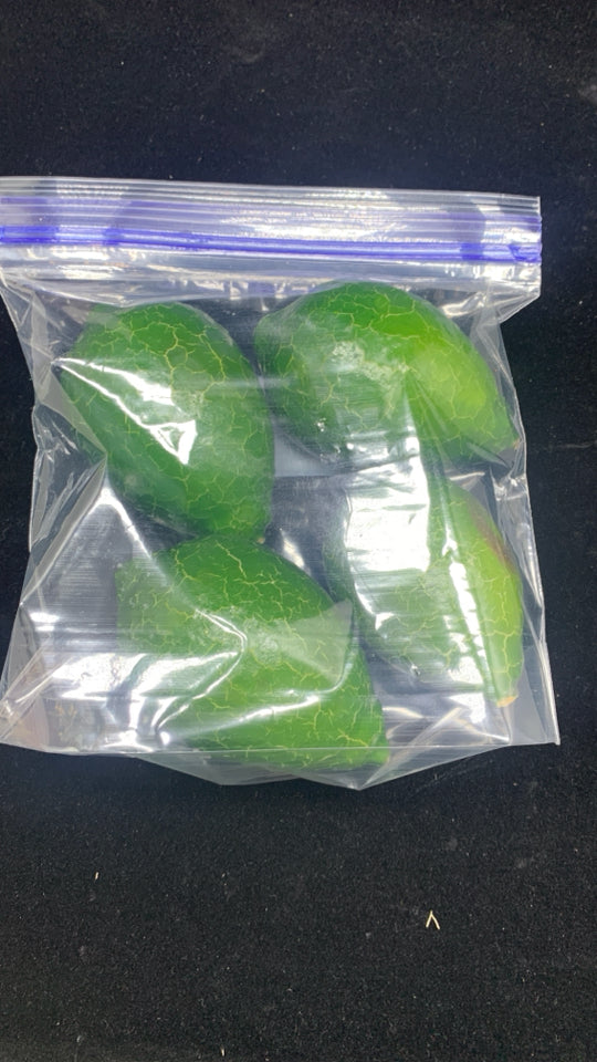 FAUX AVOCADOS IN BAG.