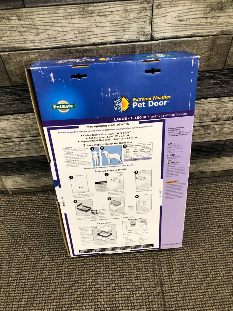 NIB LARGE PET DOOR.