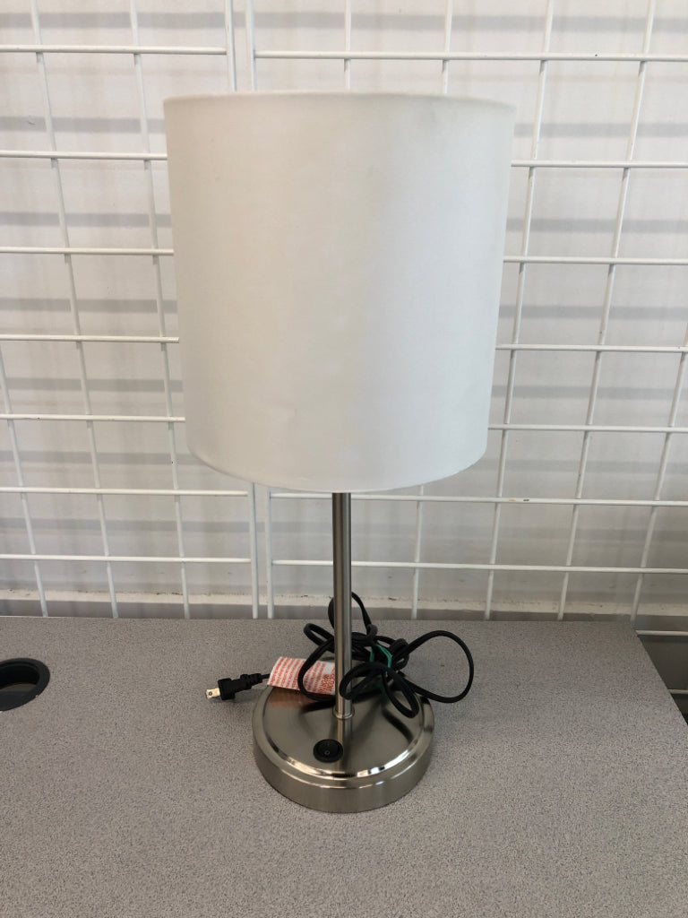 LAMP W/SILVER BASE AND WHITE SHADE.