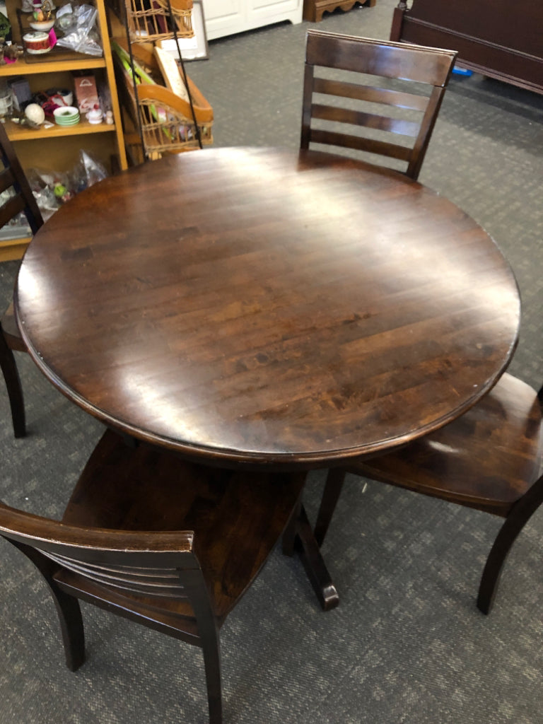DRK WOOD ROUND TABLE W/4 CHAIRS.