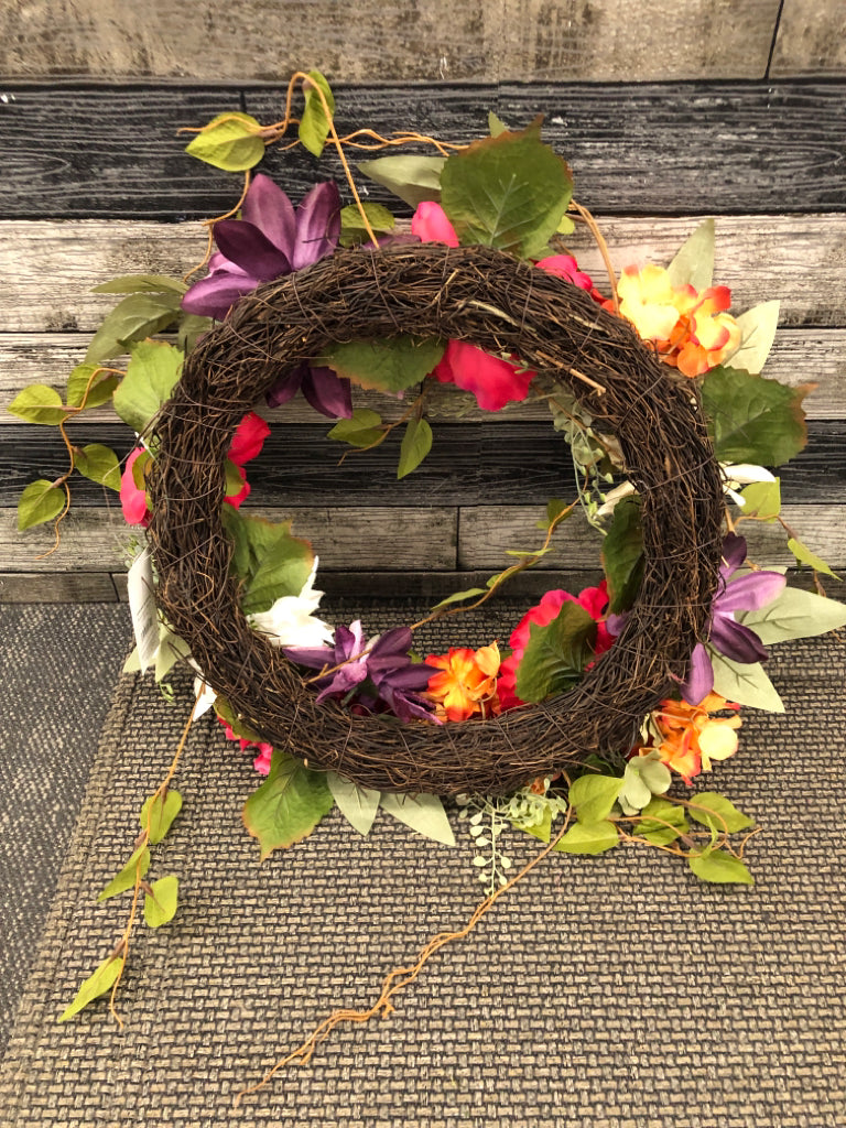 PINK AND PURPLE FAUX WREATH.