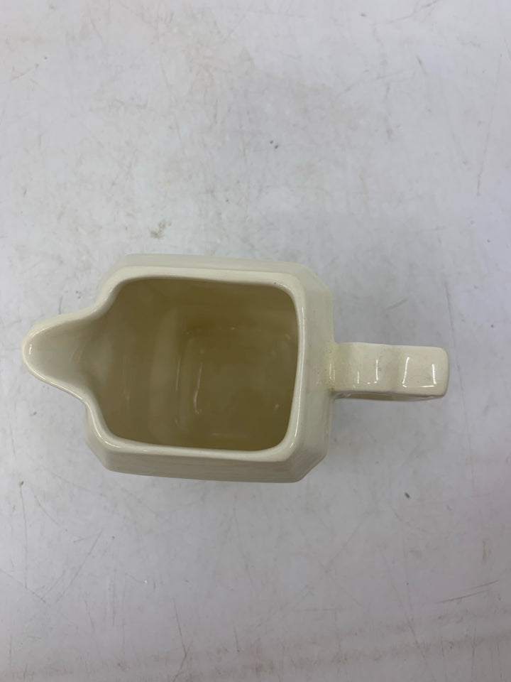 VTG IRONSTONE IVORY CREAMER W/ CRAZING.