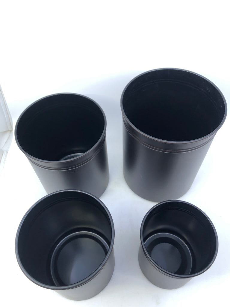 4 BROWN METAL CANISTERS.