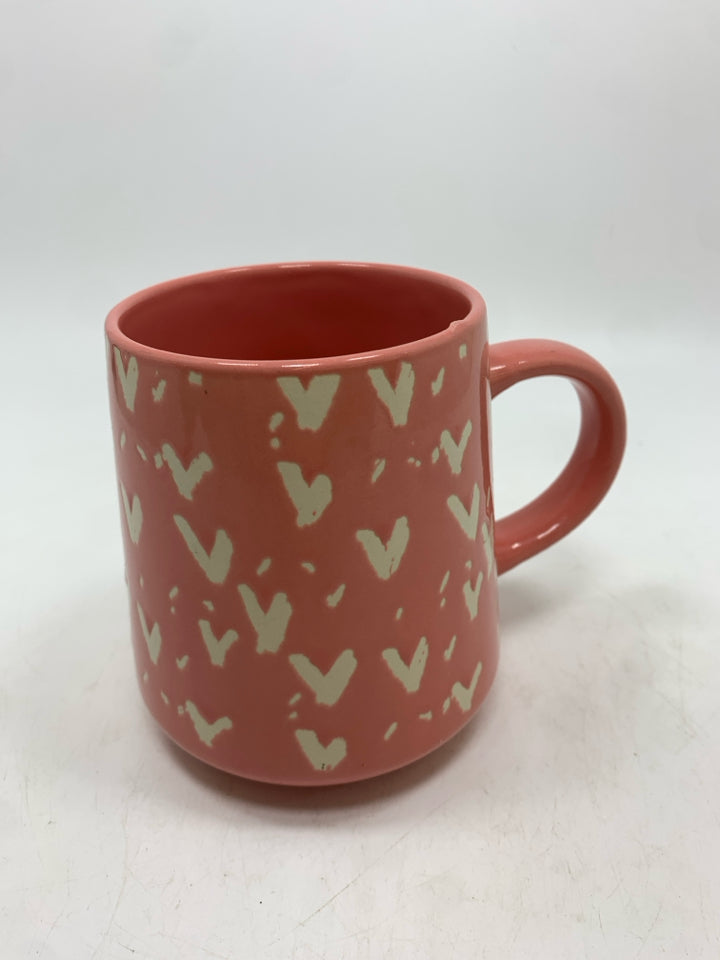 PINK GLAZED MUG W/HEART DESIGN.