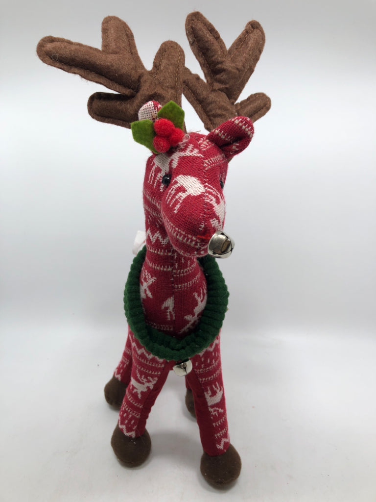 STANDING RED PLUSH REINDEER W/ GREEN COLLARS.