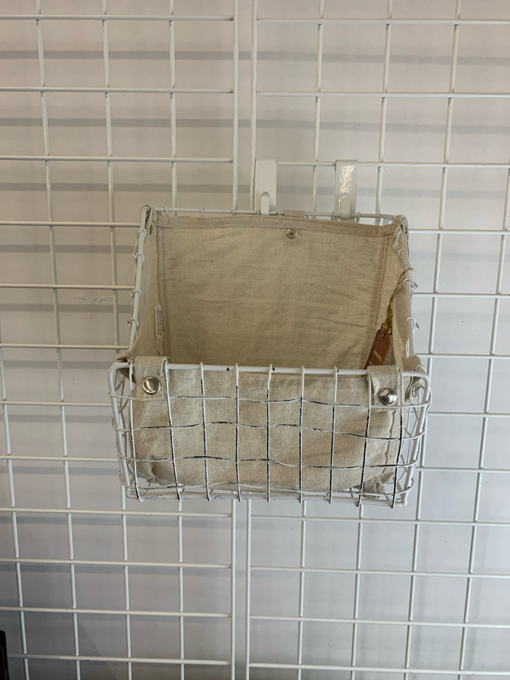 NWT FABRIC-LINED WHITE METAL STORAGE BIN.