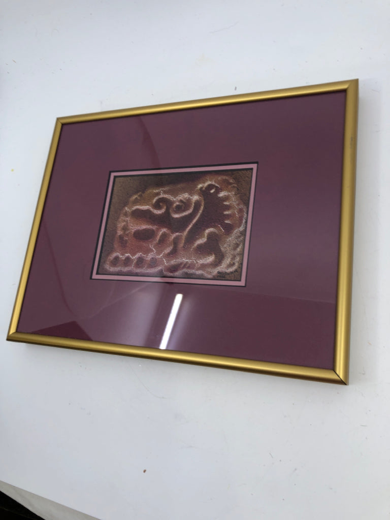 GOLD FRAME W/ MAROON BACKGROUND ABSTRACT DESIGN WALL ART.