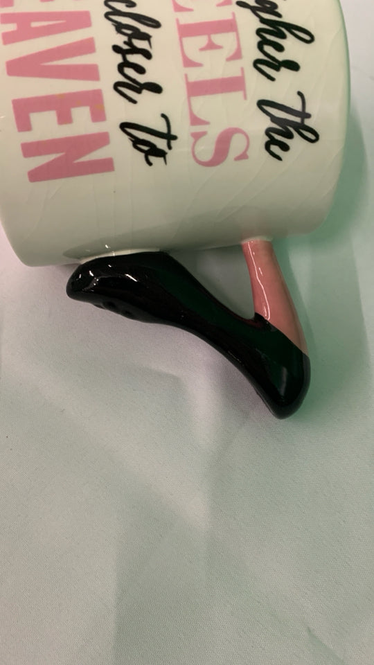 THE HIGHER THE HEELS MUG.
