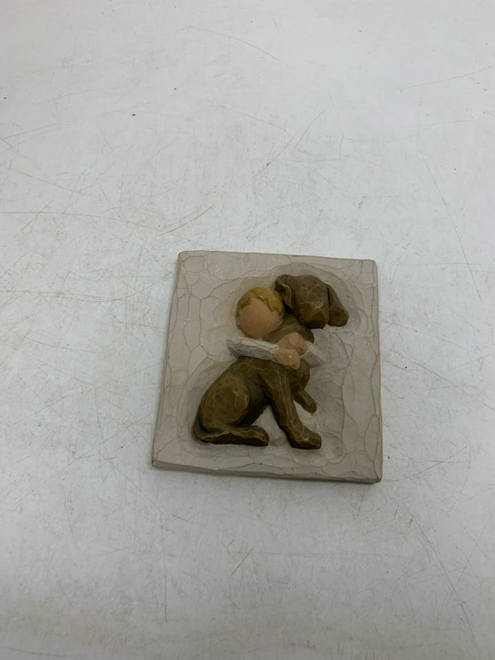 BOY HOLDING BROWN DOG " HUG" PLAQUE.