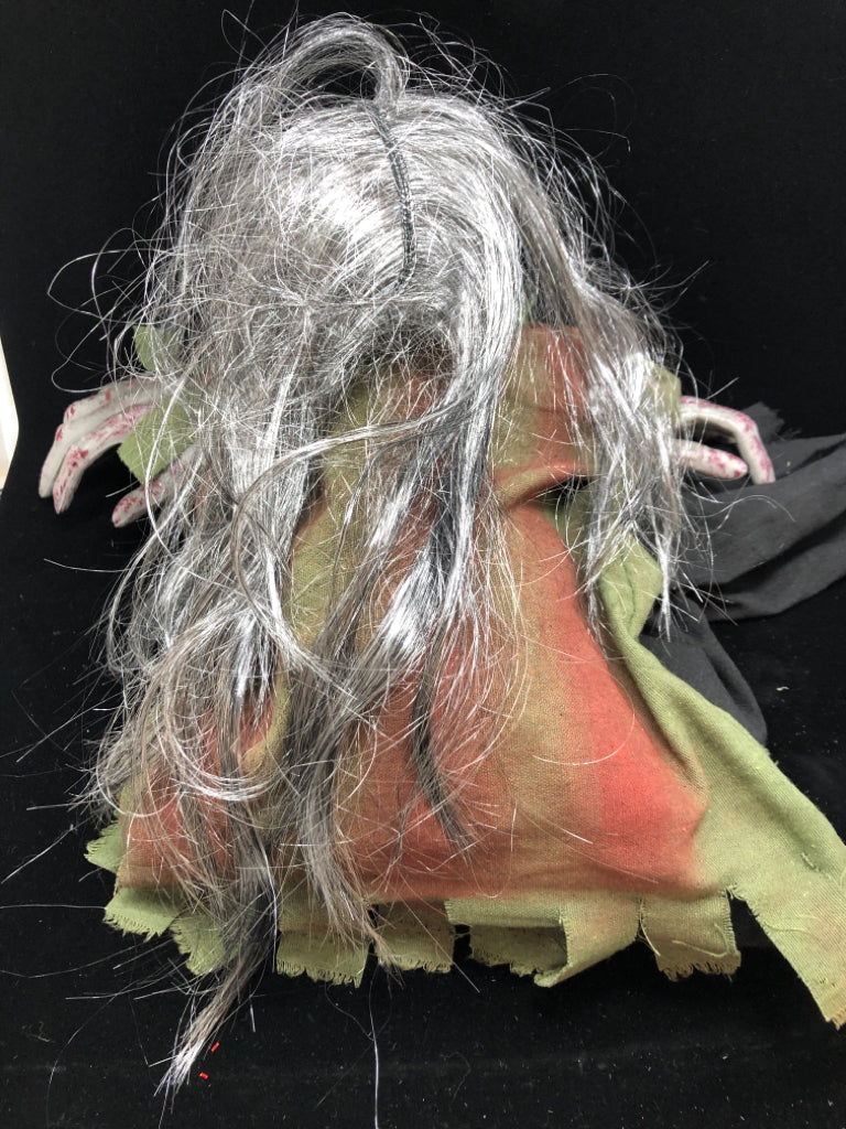 PLASTIC ZOMBIE HALLOWEEN DECOR.