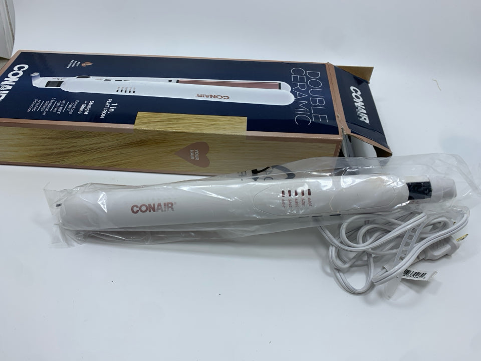 NIB DOUBLE CERAMIC HAIR FLAT IRON.