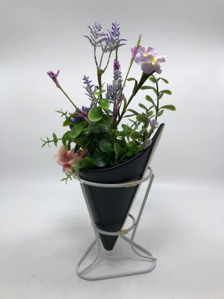 FAUX FLORALS IN STANDING PLANTER.