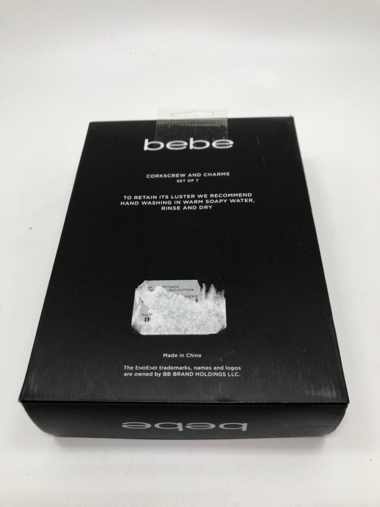 NIP RED SPARKLE CORKSCREW AND CHARMS SET.