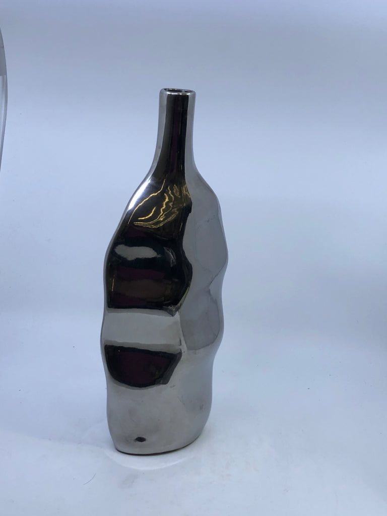 SILVER METAL TEXTURED VASE W NARROW NECK.